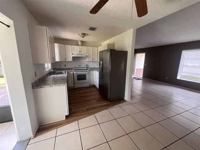 214 BLUEFIELD AVENUE, Deltona, FL 32738