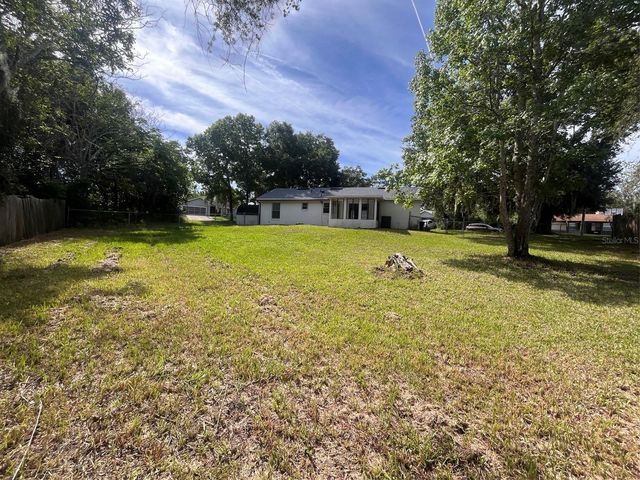 214 BLUEFIELD AVENUE, Deltona, FL 32738