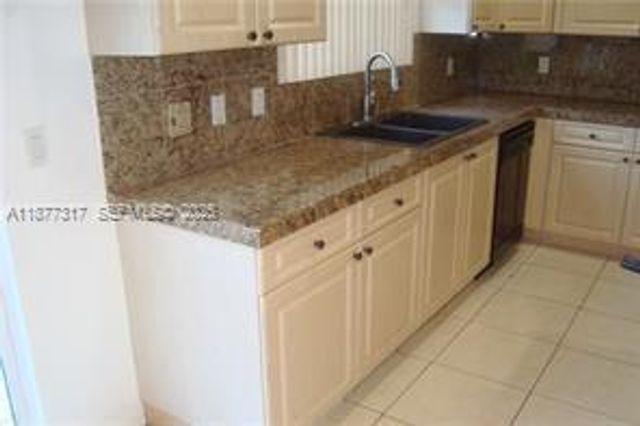 7733 NW 17th Court, Pembroke Pines, FL 33024