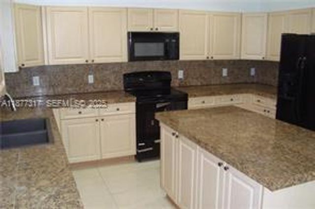 7733 NW 17th Court, Pembroke Pines, FL 33024