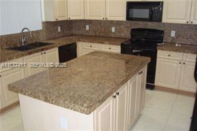 7733 NW 17th Court, Pembroke Pines, FL 33024