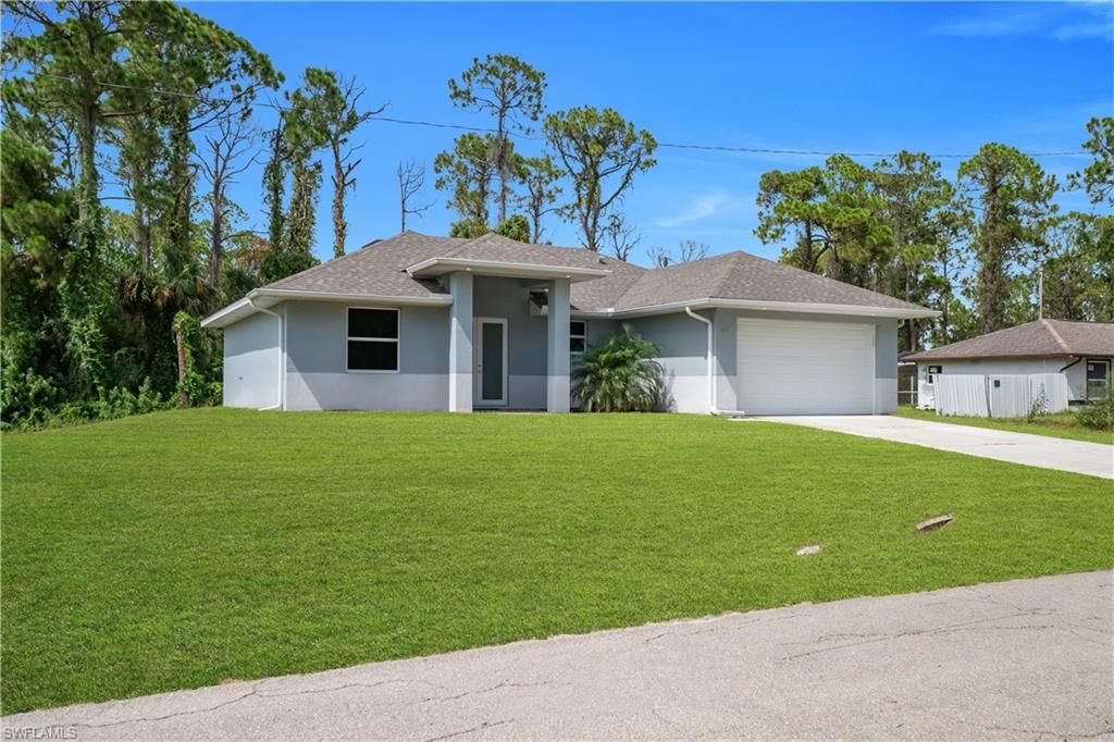 1901 E 7th ST, LEHIGH ACRES, FL 33936 — photo 2