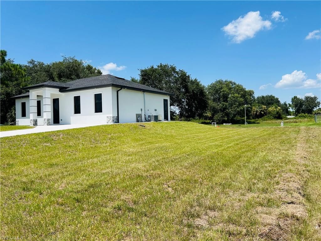3705 E 15th ST, LEHIGH ACRES, FL 33972 — photo 4