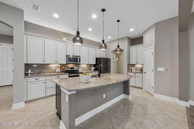 1322 WARBLER Way, Middleburg, FL 32068