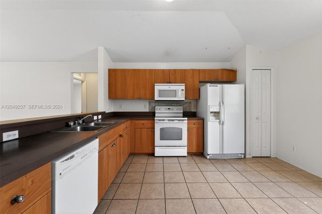 446 Windermere Drive, Lehigh Acres, FL 33972