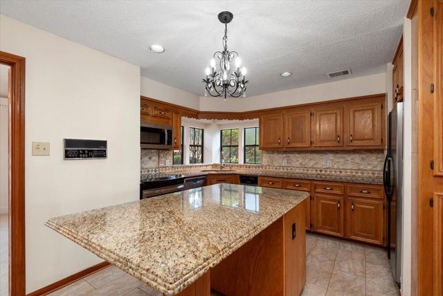 7514 Pinehurst Shadows Drive, Humble, TX 77346