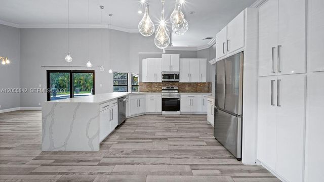 5831 NW 81st Ter, Parkland, FL 33067