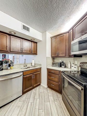 10401 W Broward Blvd 302, Plantation, FL 33324