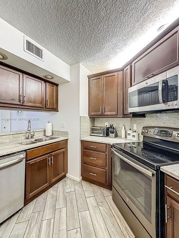 10401 W Broward Blvd 302, Plantation, FL 33324