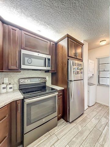 10401 W Broward Blvd 302, Plantation, FL 33324