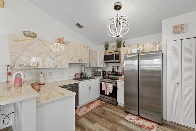 210 NW Zanzibar Pl, Port St. Lucie, FL 34986