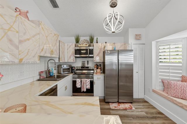 210 NW Zanzibar Pl, Port St. Lucie, FL 34986