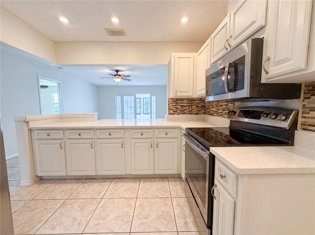 1838 N PEBBLE BEACH BOULEVARD, Sun City Center, FL 33573