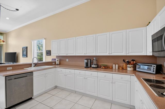109 Palm Circle, Atlantis, FL 33462