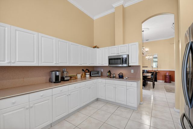 109 Palm Circle, Atlantis, FL 33462