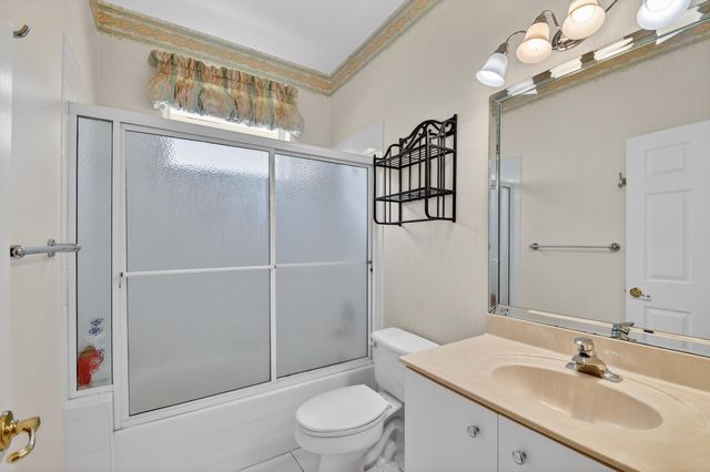 109 Palm Circle, Atlantis, FL 33462