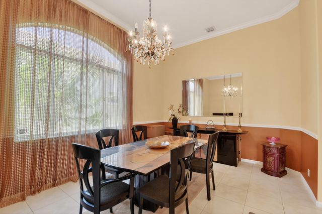 109 Palm Circle, Atlantis, FL 33462