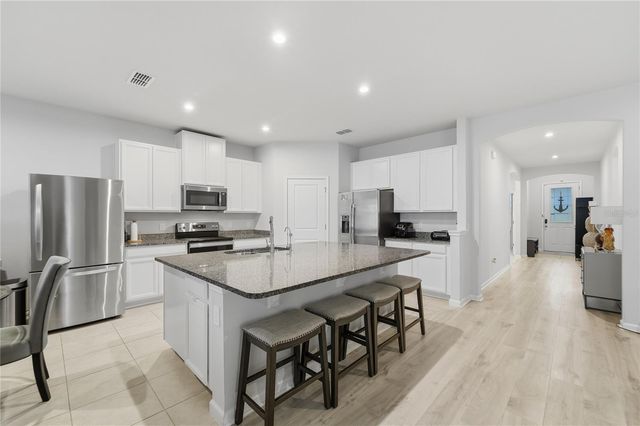 3242 HILL POINT STREET, Minneola, FL 34715