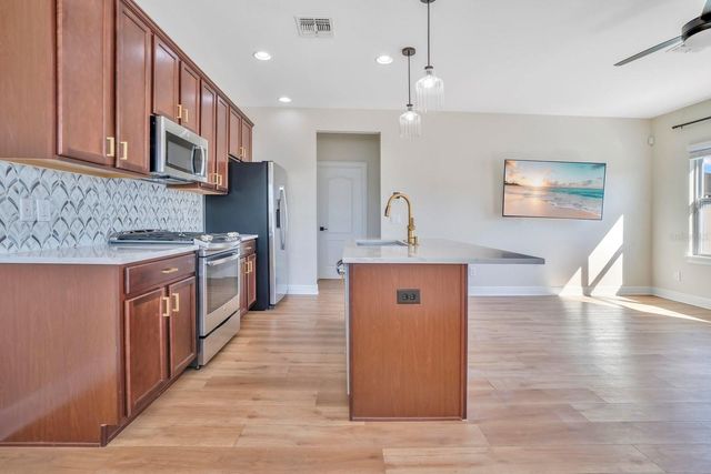 13093 LESSING AVENUE, Orlando, FL 32827