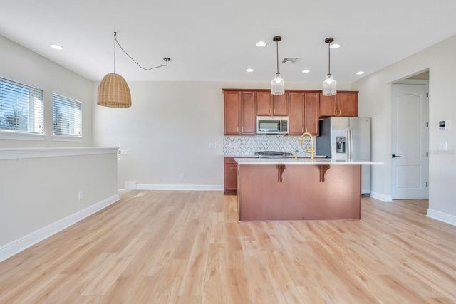 13093 LESSING AVENUE, Orlando, FL 32827