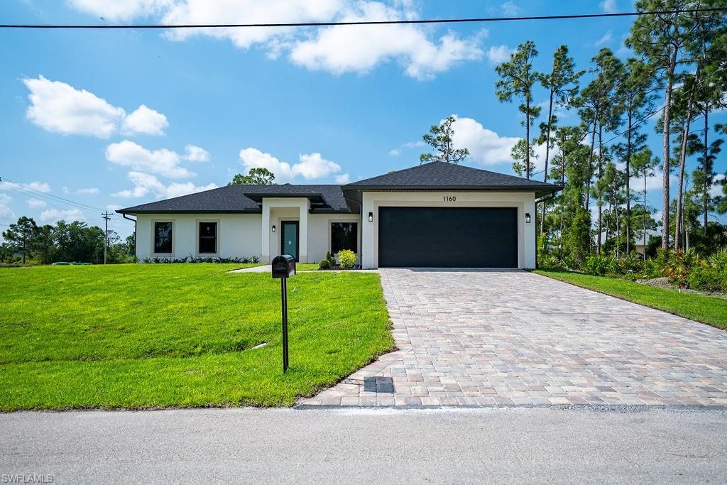 1160 Edelweiss ST E, LEHIGH ACRES, FL 33974 — exterior