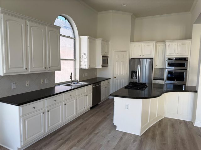 8715 Rippling Water Drive, Sugar Land, TX 77479