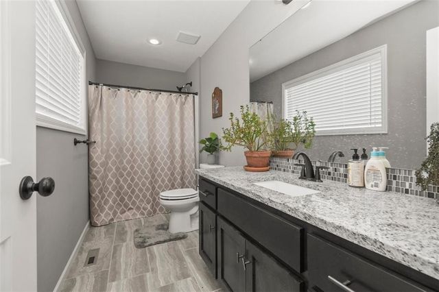 839 Creekmoor Pond Lane, Raymore, MO 64083