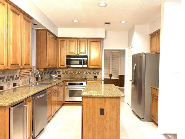 7710 Misty Fern Court, Houston, TX 77095