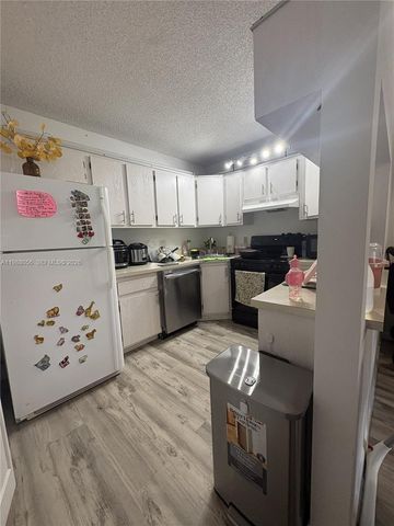 721 Sunny Pine Way C2, Green Acres, FL 33415