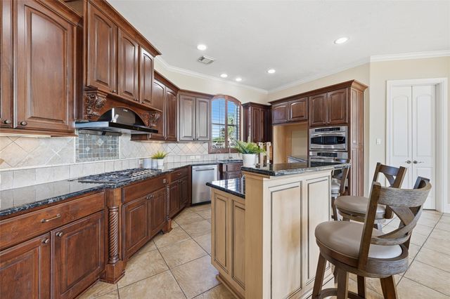 8802 Saxonwood Court, Richmond, TX 77469