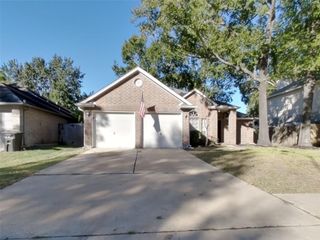 18707 Singing Woods Drive, Humble, TX 77346