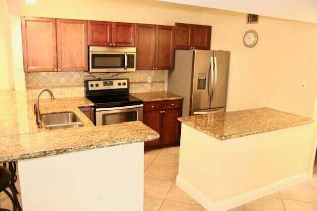 6436 CHASEWOOD Drive B, Jupiter, FL 33458