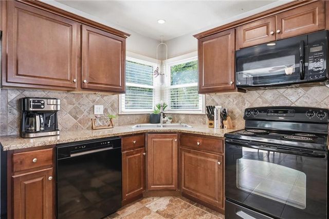 8233 Woodward Street, Overland Park, KS 66204