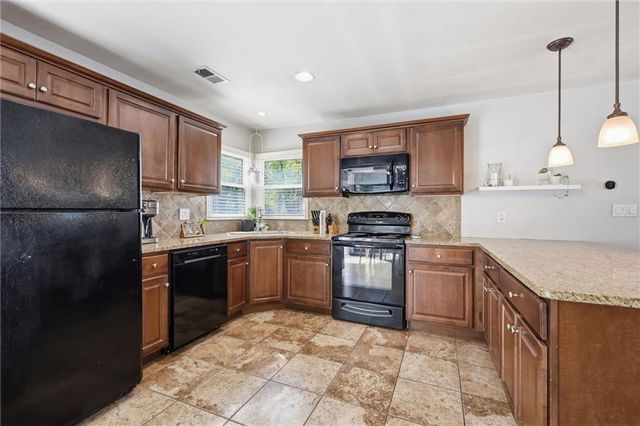 8233 Woodward Street, Overland Park, KS 66204