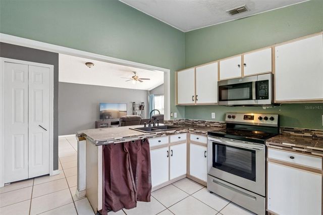 5121 LUNA NEGRA DRIVE, Orlando, FL 32811