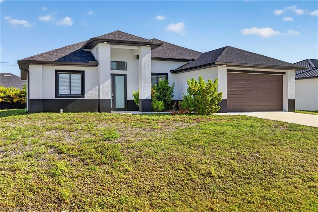 1715 SW 3rd ST, CAPE CORAL, FL 33991 — exterior