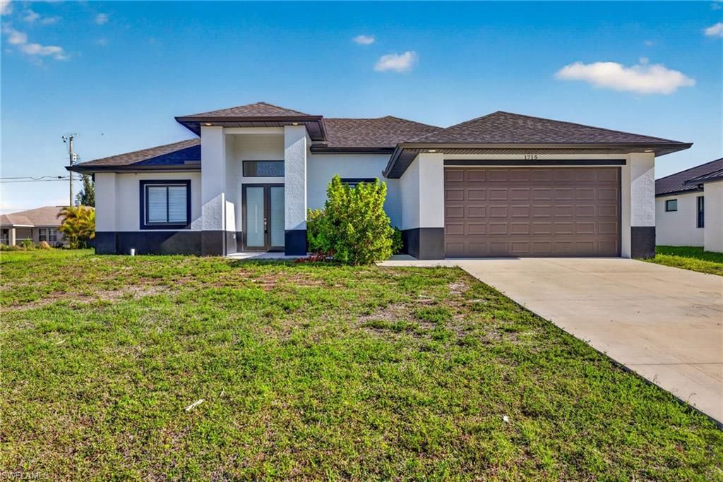 1715 SW 3rd ST, CAPE CORAL, FL 33991 — photo 2