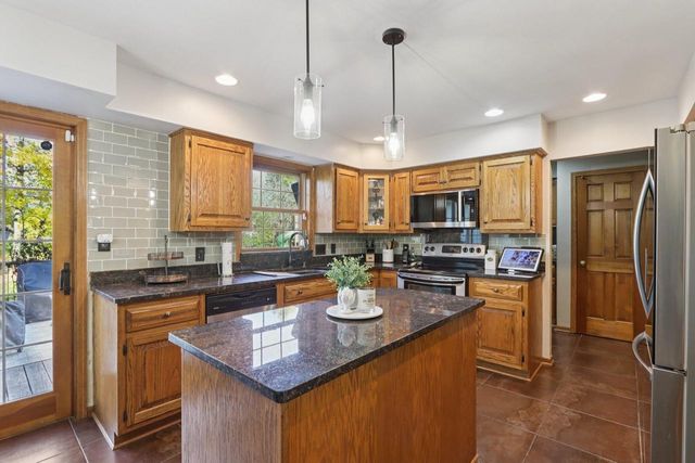 9740 W Huntington DRIVE, Mequon, WI 53097