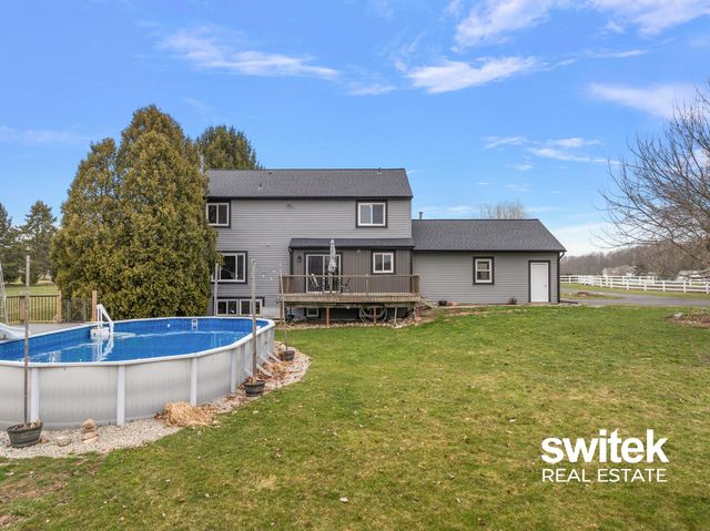 9750 Meadow Valley SE, Caledonia, MI 49316