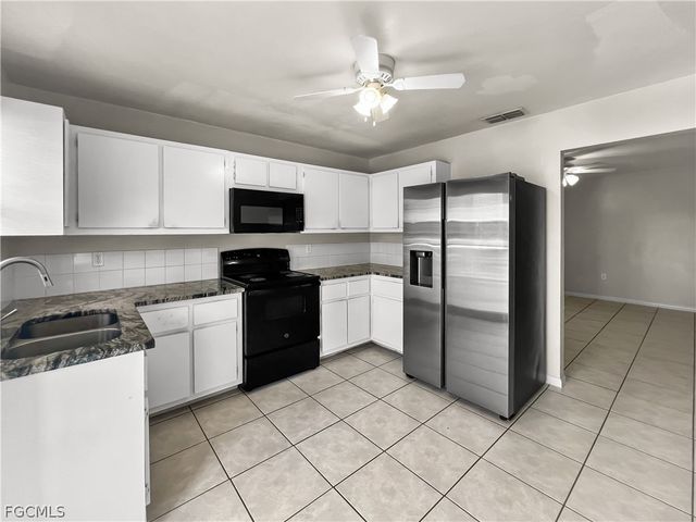 2704 Owen AVE, Lehigh Acres, FL 33973