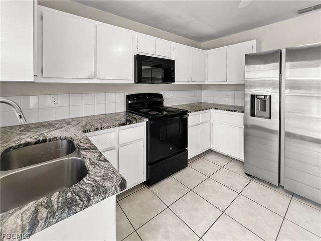 2704 Owen AVE, Lehigh Acres, FL 33973