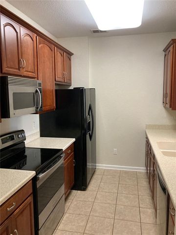 3326 ROBERT TRENT JONES DRIVE 20302, Orlando, FL 32835