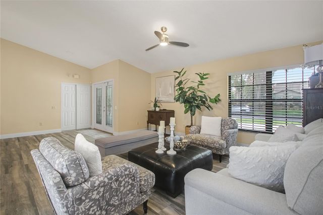 7243 WOODVILLE CRESCENT, Orlando, FL 32819