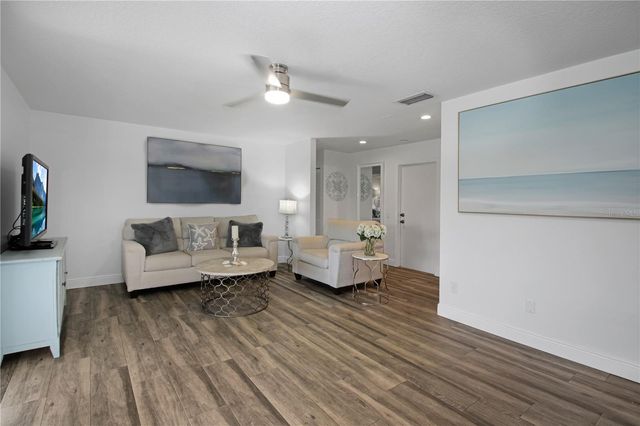 7243 WOODVILLE CRESCENT, Orlando, FL 32819