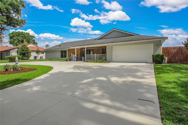 7243 WOODVILLE CRESCENT, Orlando, FL 32819