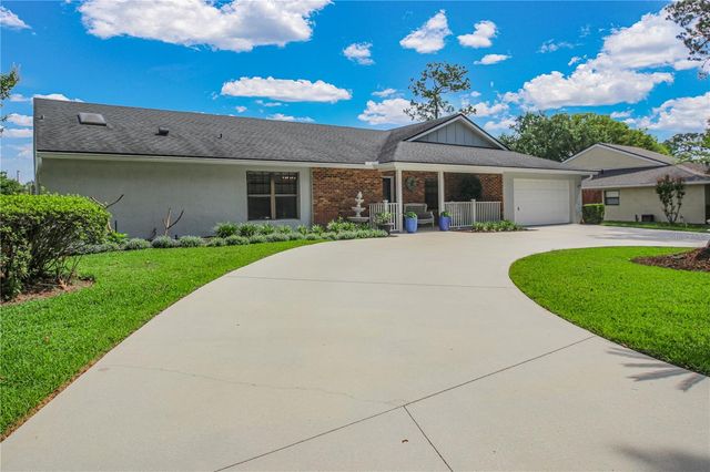 7243 WOODVILLE CRESCENT, Orlando, FL 32819