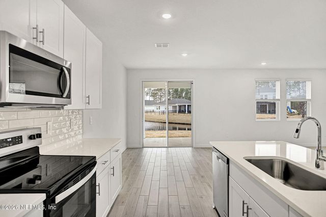 62 WANDERING CREEK Way, Palm Coast, FL 32164