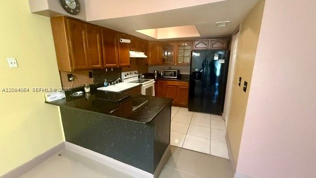 12 Meacham Ln 12, Tamarac, FL 33319
