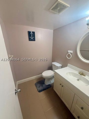 12 Meacham Ln 12, Tamarac, FL 33319