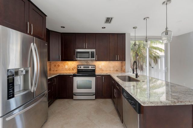 9859 NW 2nd Street, Plantation, FL 33324